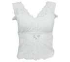 Top de encaje blanco con escote en pico y acabado floral