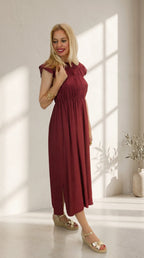 Vestido Capri de color burdeo con cuñas doradas