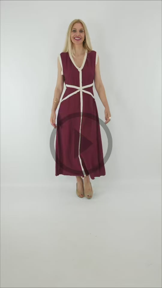 Video del Vestido Sevilla burdeos con detalle desflecado en contraste en cintura y escote